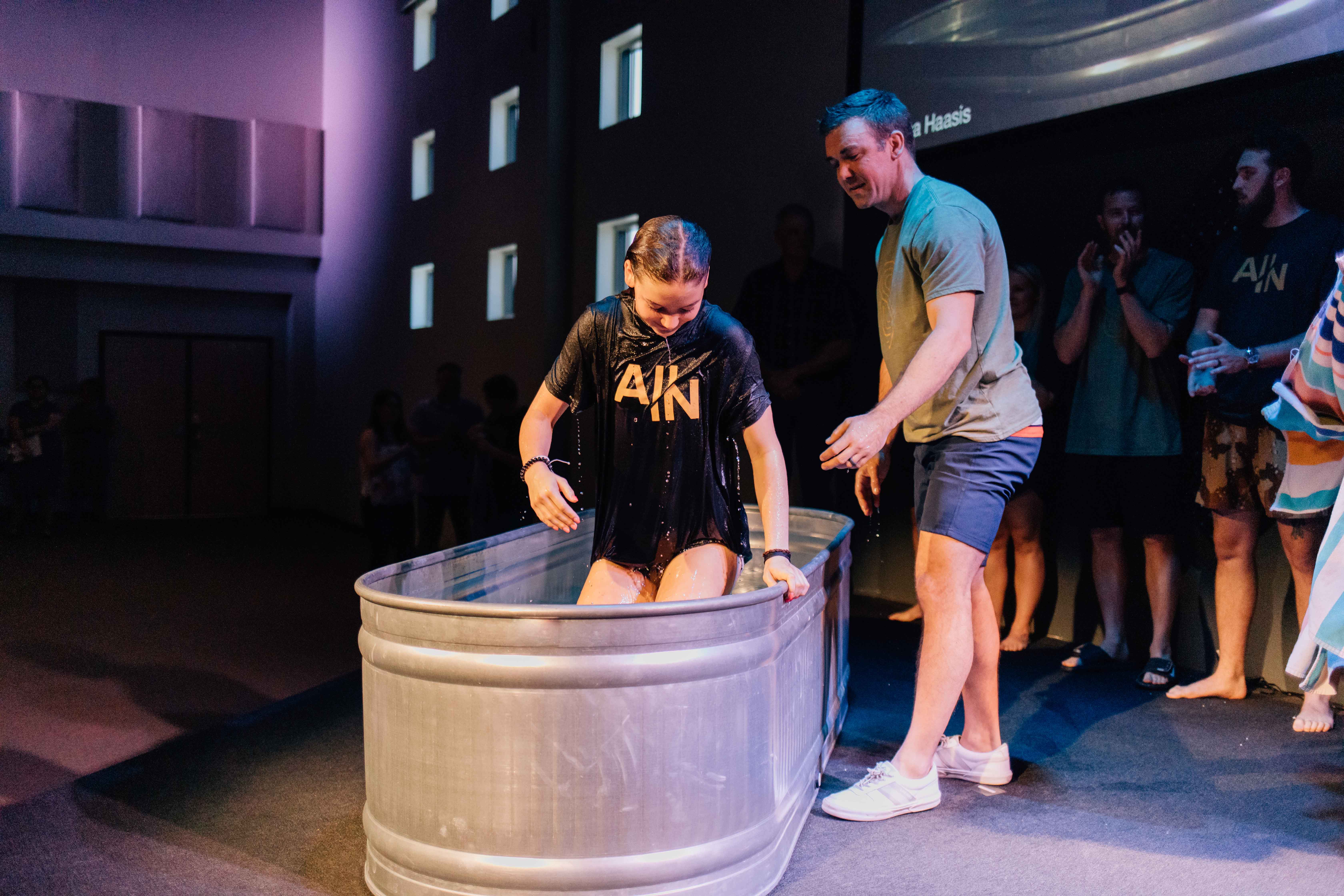 students at sunday morning church service, baptism