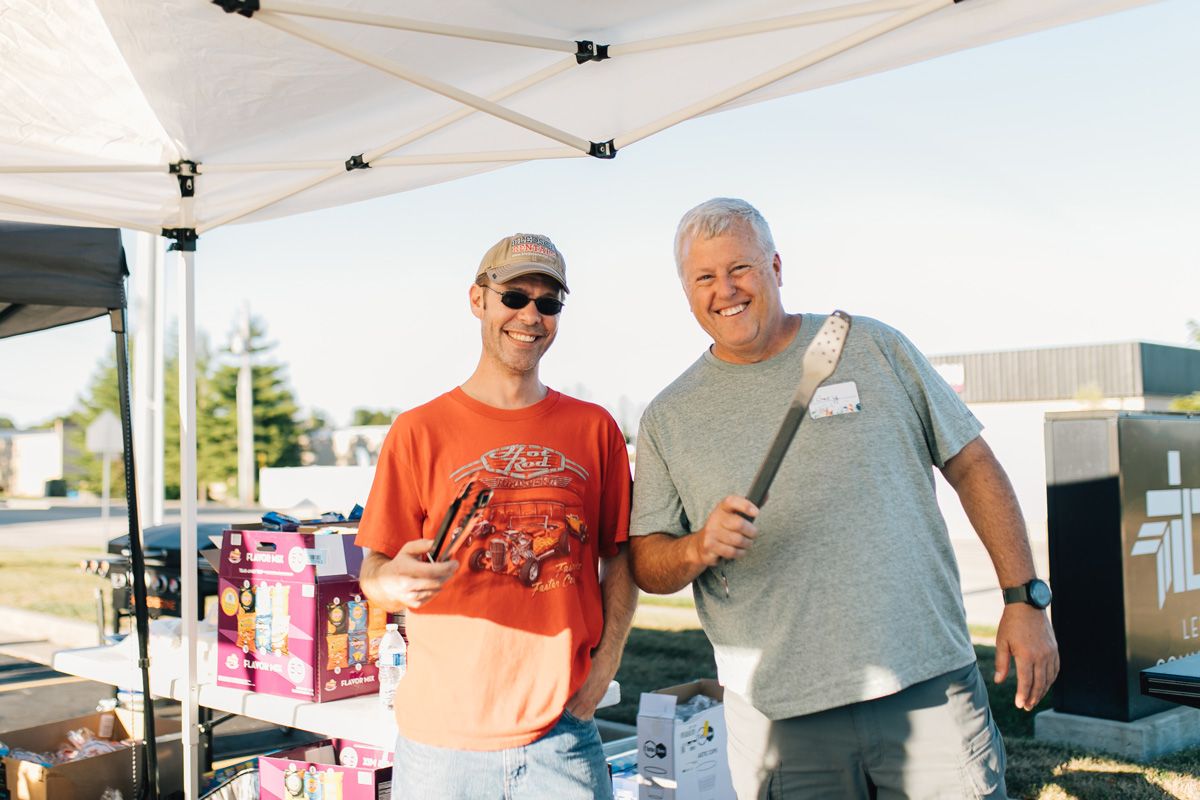 men's group grilling