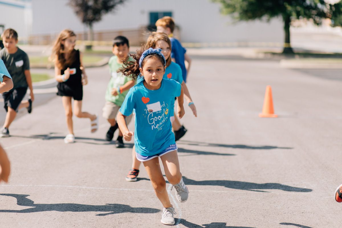 Young Girl Playing Outdoor Game At VBS