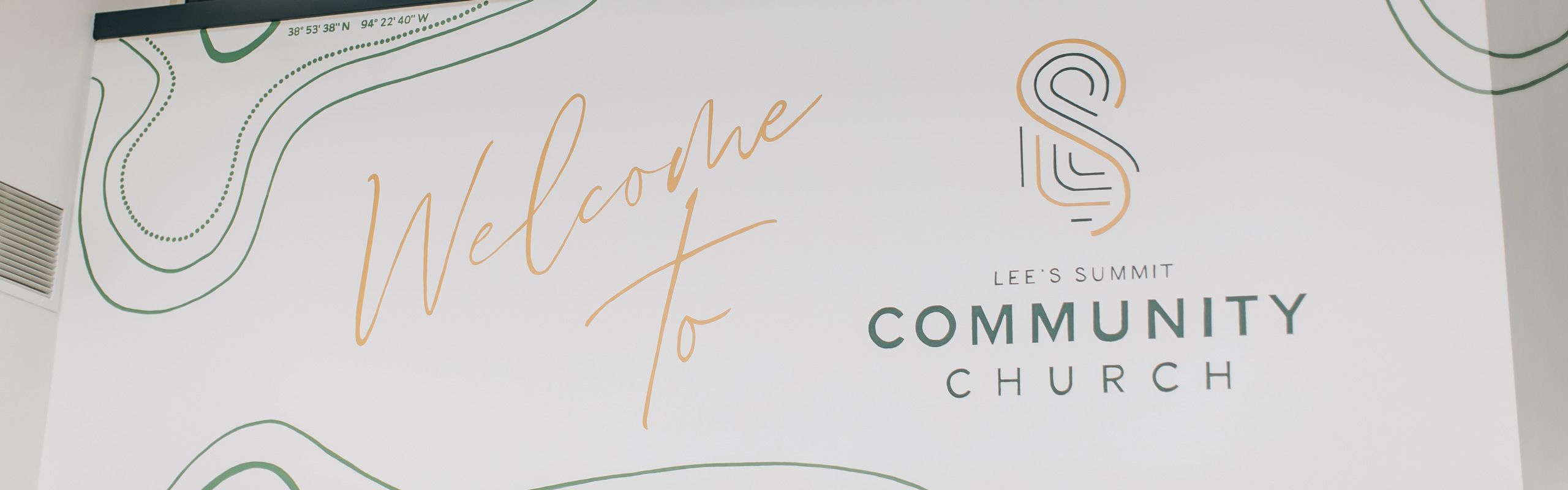 Wall art showing welcome to lee's summit community church
