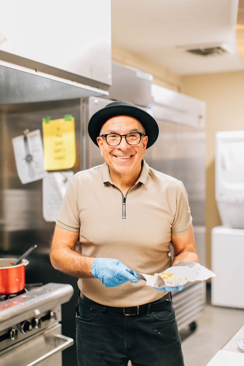 serving meals at community cafe event