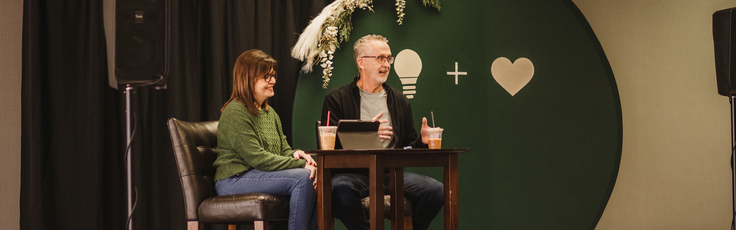 professional marriage counselors leading discussion at marriage retreat