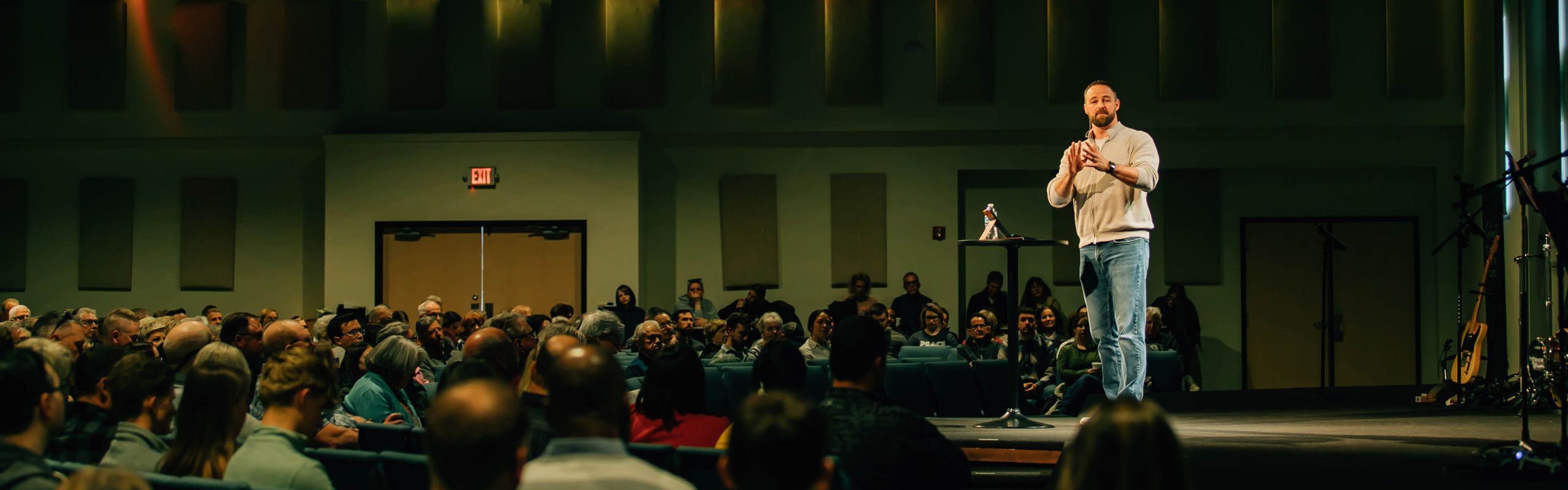 pastor teaching at a sunday morning church service in Lee's Summit